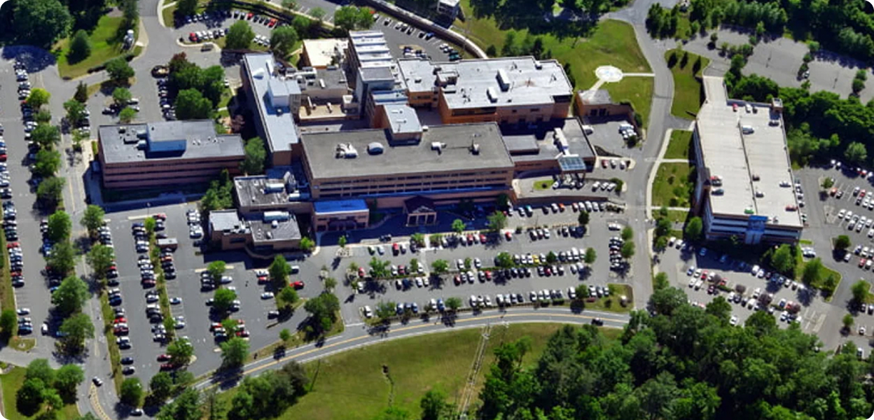 Aerial view of a large hospital or multi-building medical campus.