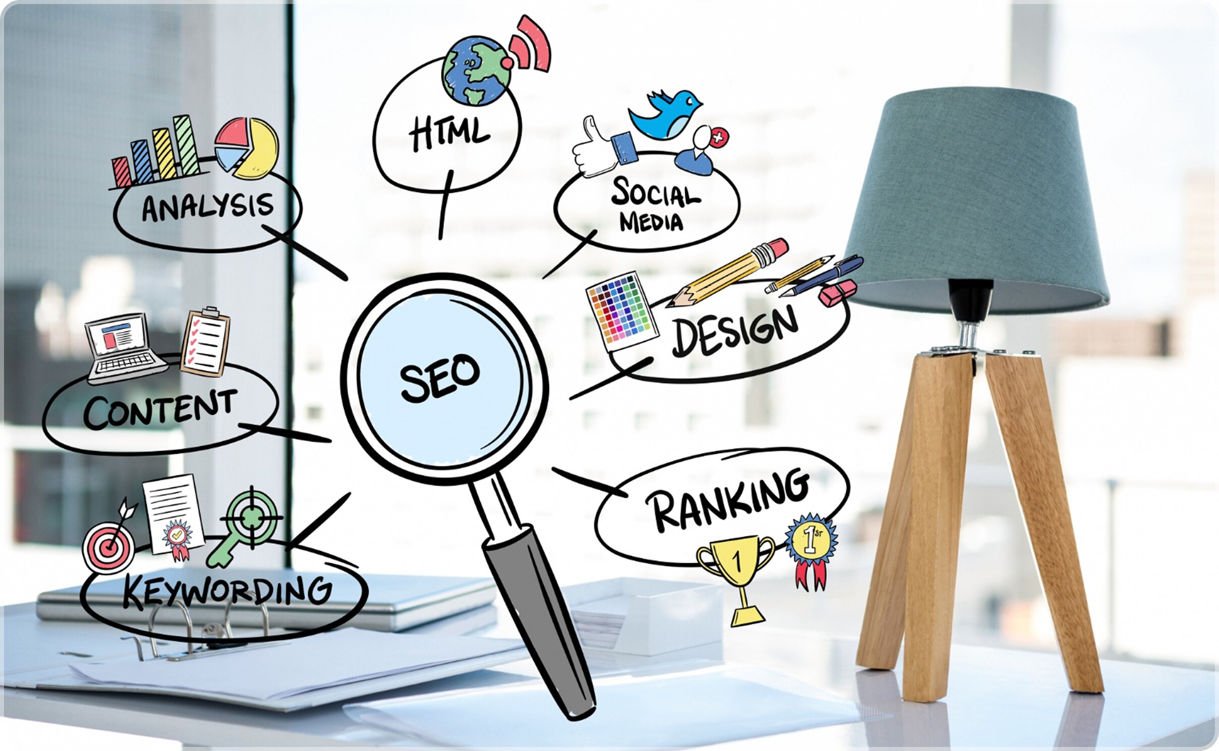 A brightly lit desk with a modern lamp, overlaid with a hand-drawn mind map illustrating SEO concepts like analysis, content, keywording, and ranking.